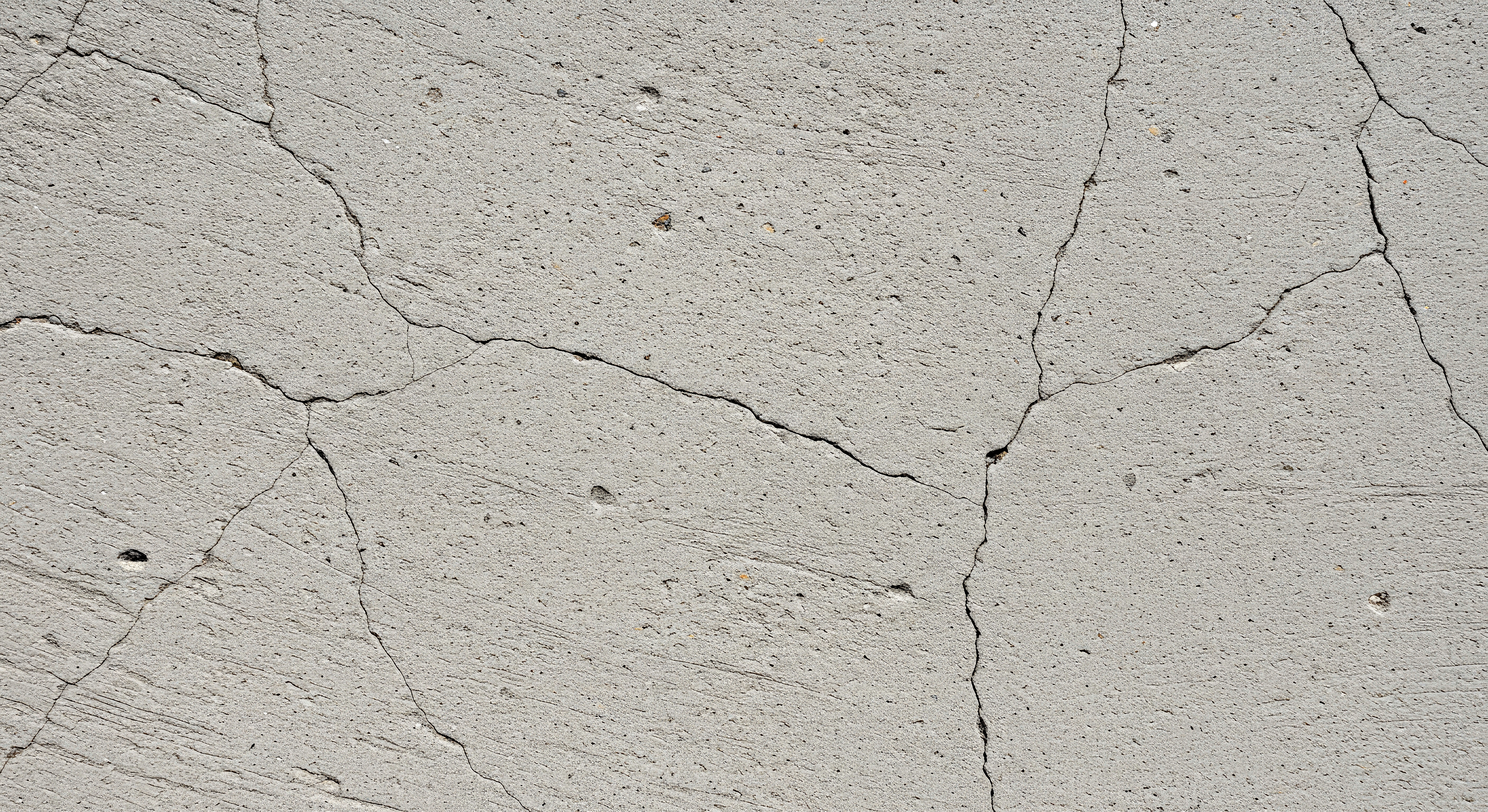 Before: cracked and stained concrete floor